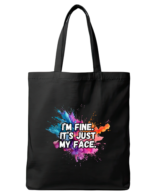 Black cotton tote bag featuring the quote I'm fine it's just my face