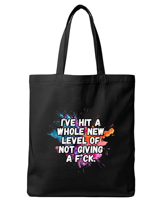 Black cotton tote bag featuring the quote I've hit a whole level of not giving a f*ck