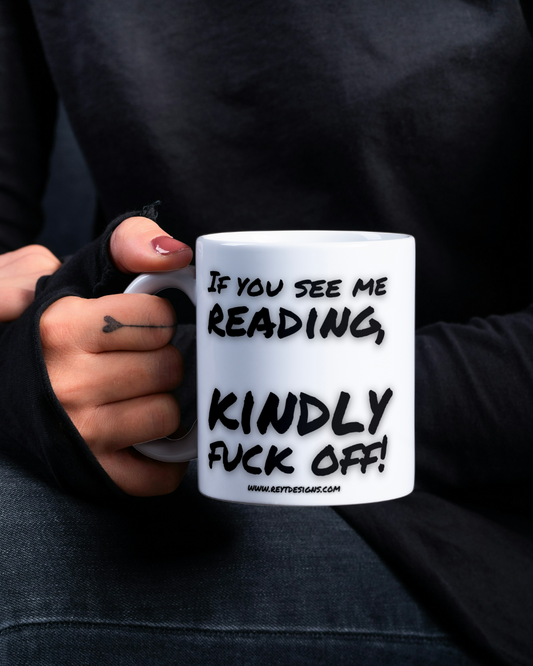 If you see me reading, kindly fuck off - Ceramic Mug